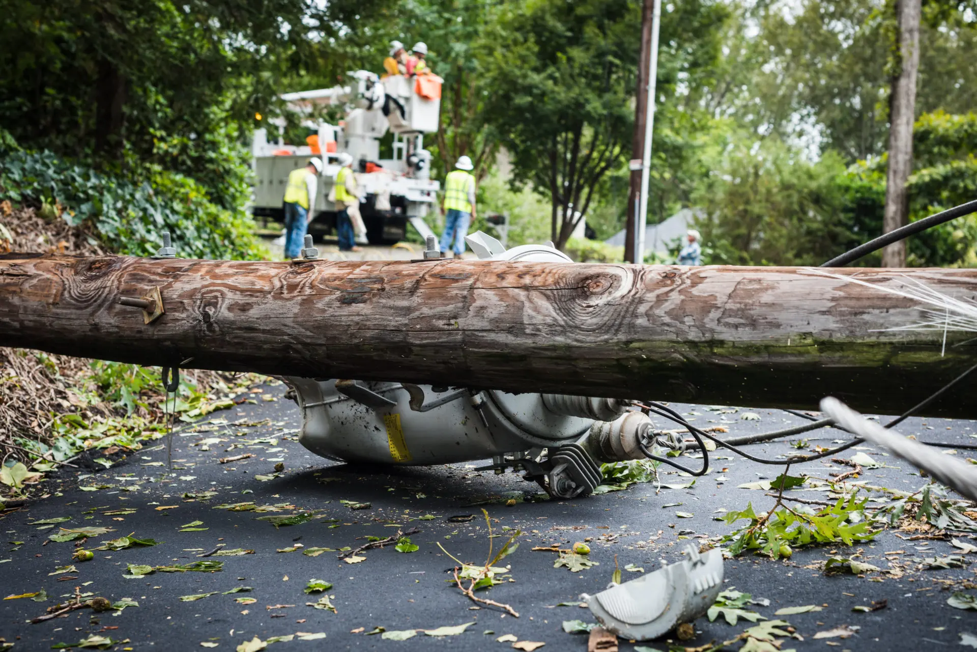 Down power lines and electric equipment in residential neighborhood